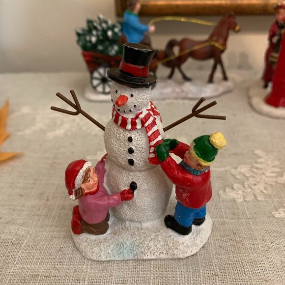St. Nicholas Square Village Children Building Snowman Figurine - Picture 1 of 2